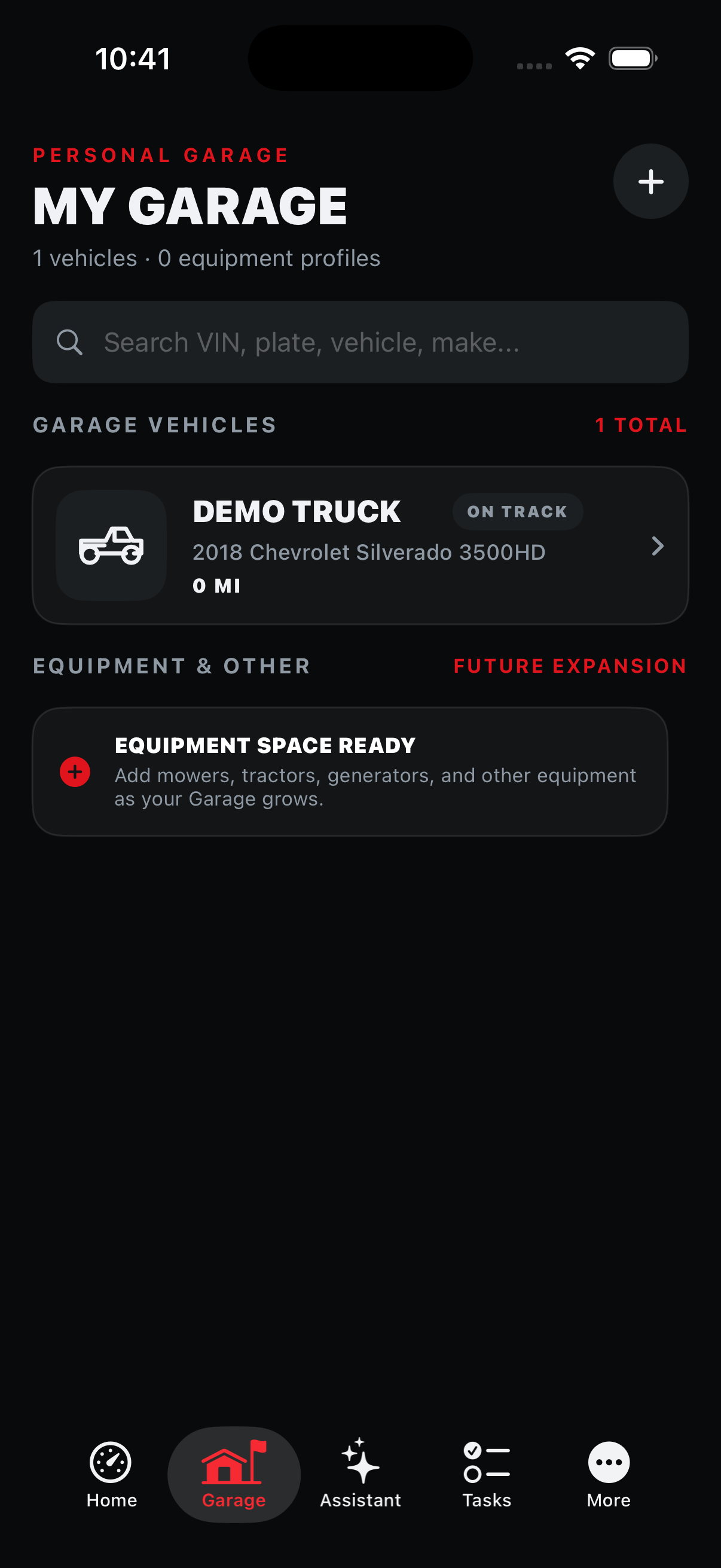 Wrenchd My Garage screen with a search bar and a Demo Truck vehicle on track